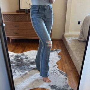Distressed boot cut jeans